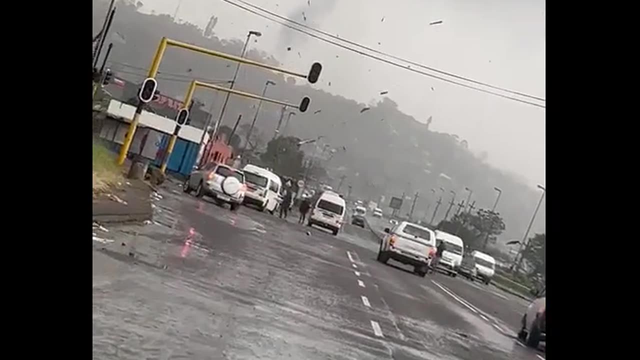 Debris flies in the air during suspected tornado north of Durban