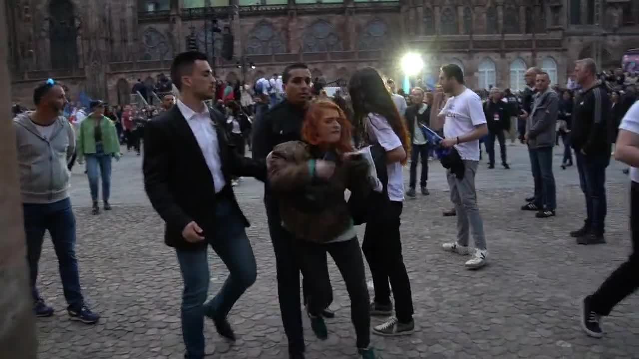 People dragged away by Macron's security in Strasbourg