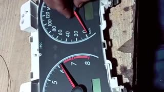 Repairer assembles instrument panel Pointer car Maintenance and repair instrument panel