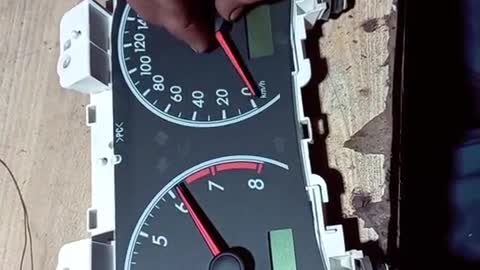 Repairer assembles instrument panel Pointer car Maintenance and repair instrument panel