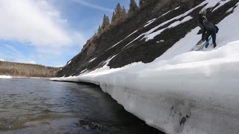 Guy Hesitated Sending It off Snowy Icy Slope Then Fell Into the River