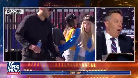 RAMS QUARTERBACK IGNORES FALLING PHOTOGRAPHER