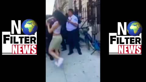 Woman PUNCHED by NYPD officer 😳😮