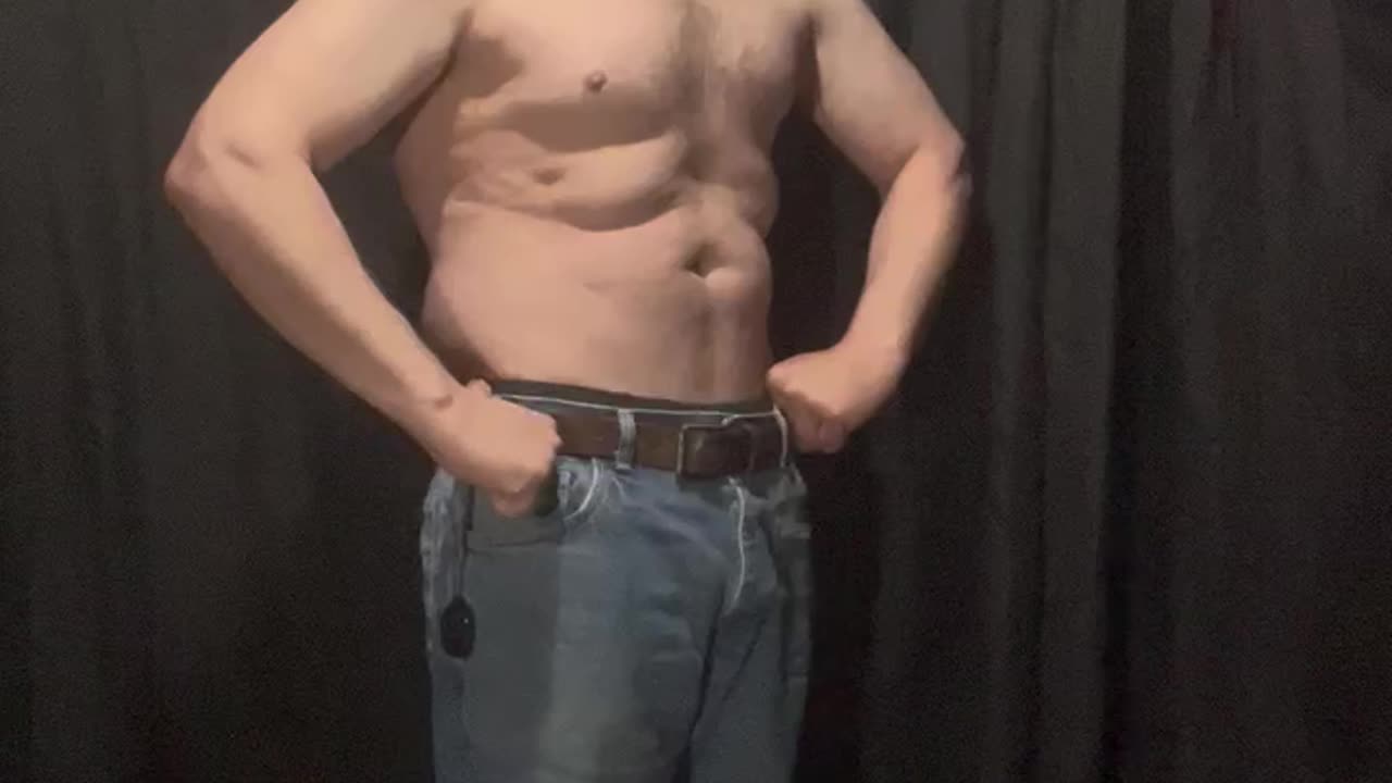 Fat man flexes his flab 6 of 14