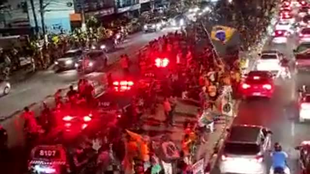 The Brazilian people are on the streets in front of the Brazilian army barracks