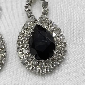 Rhodium Plated 2.75” Drop Earrings. Made with Austrian Crystal. Party. Event