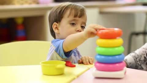 Handsome kid playing