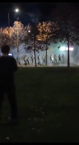 Petrol bombs and fireworks are being thrown at riot police in Edinburgh, Scotland