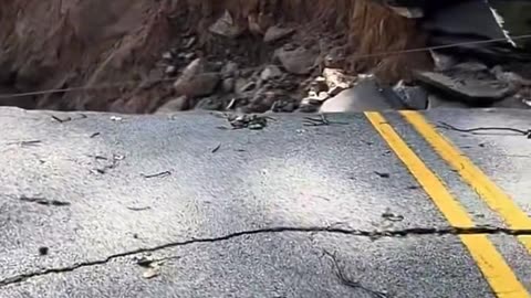 Flood Completely Destroys Road