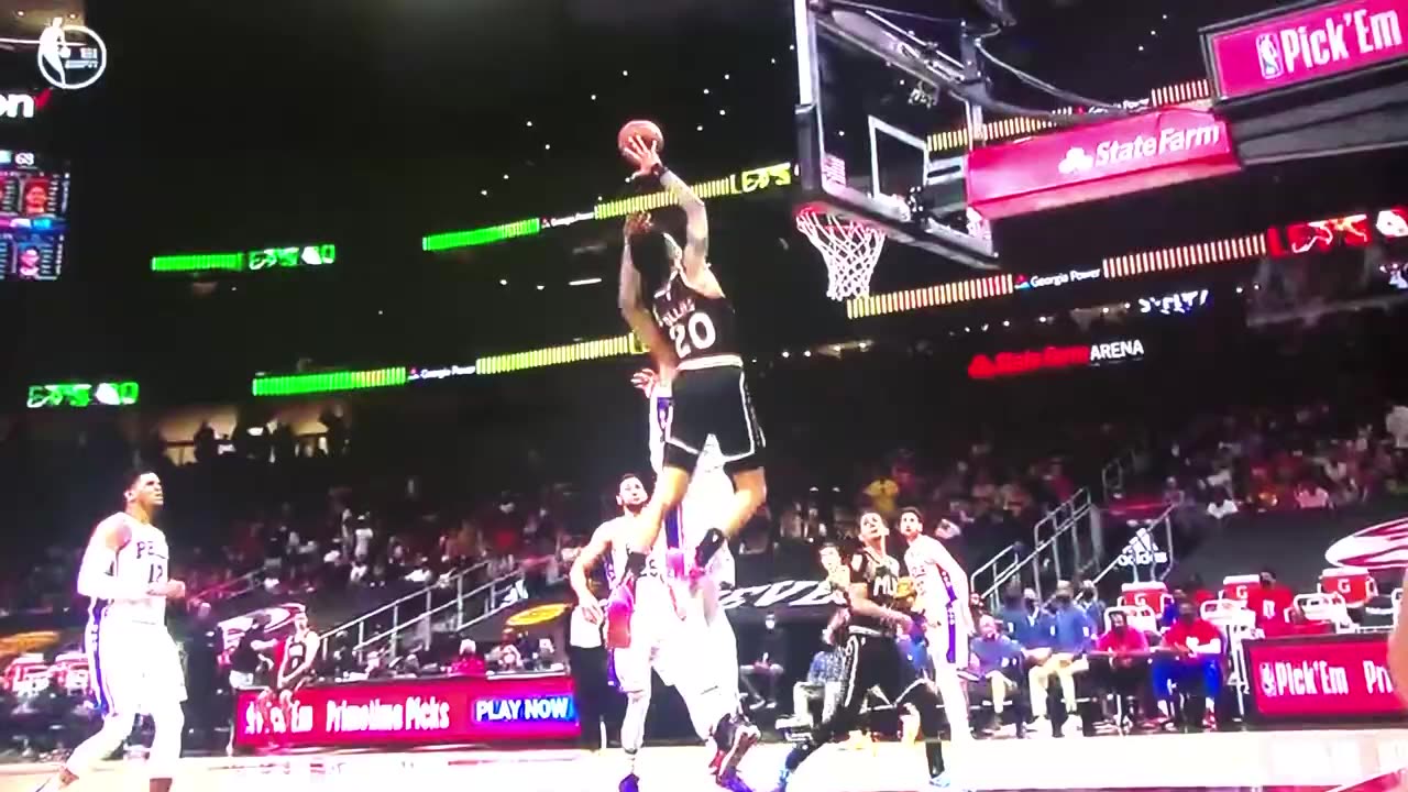 Let’s Not Forget John Collins Put Joel Embiid on a Poster and T-shirt 😆