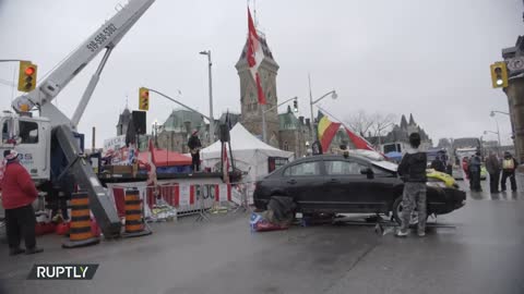Show of force in Ottawa as police clear main protest hub Truckers defy heavy police presence Ottawa
