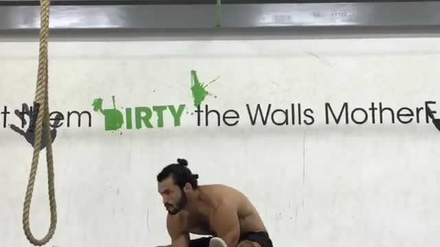 Man Shows Amazing Strength While Balancing on Back of His Hands