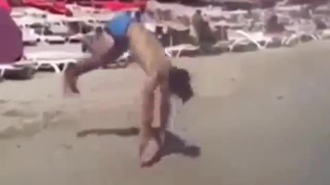 The acrobats are at the beach