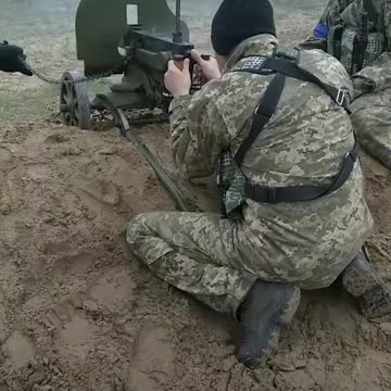 Ukrainian Volkssturm with Maxim machine guns somewhere in the Donbass