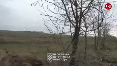 Ukrainian fighters gather to vehicles ammunition that Russians abandoned around Bakhmut