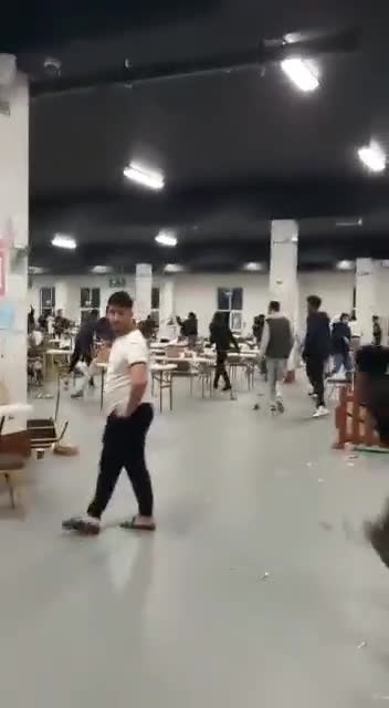 Footage from inside the CityWest refugee centre in West Dublin tonight as migrants fought amongst themselves, 3 taken away in an ambulance.