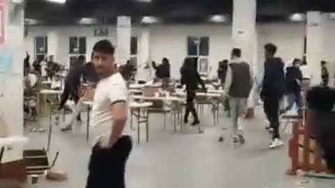 Footage from inside the CityWest refugee centre in West Dublin tonight as migrants fought amongst themselves, 3 taken away in an ambulance.