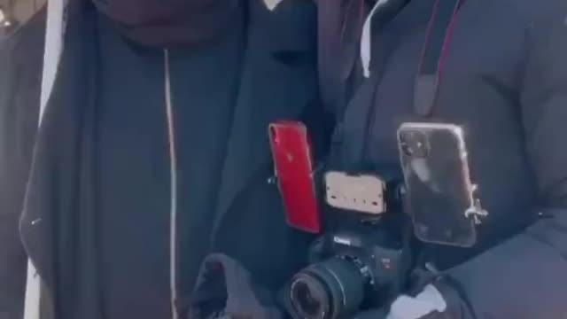 Man speaks to group of white counter protestors at Toronto’s convoy protest