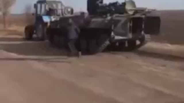 Ukrainian Farmer Steals Russian AA Vehicle With Tractor | #Shorts