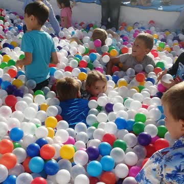 Children drown in colored balls
