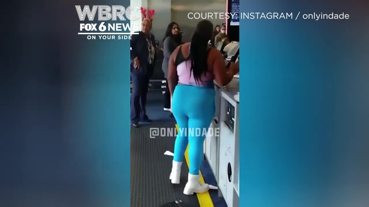 Woman panics, throws computer at airline staff