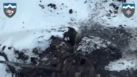 Russian military gymnastics, next to a cooked tank. Footage from Ukrainian drone.