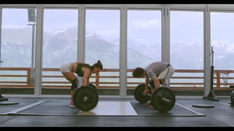 Couple Working Out at the Gym