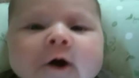 Baby gets adorably started when daddy suddenly starts speaking