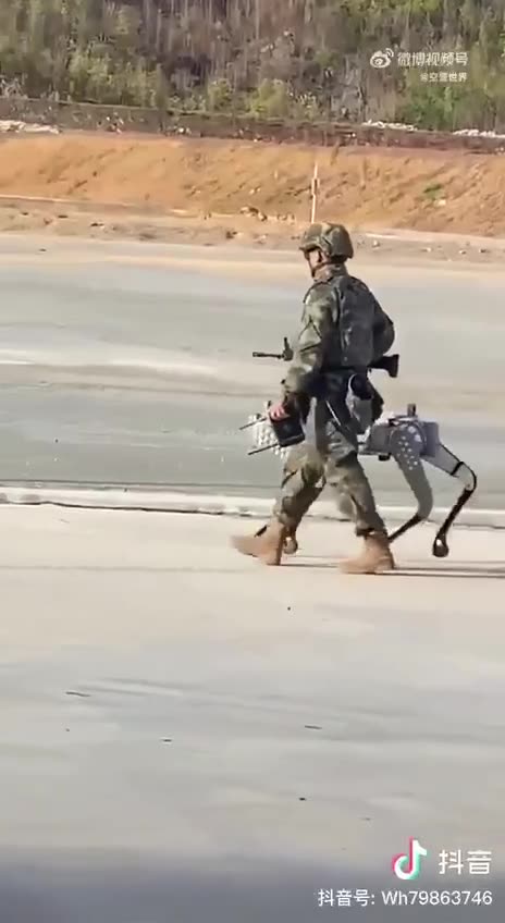 Chinese PLA Soldier Taking His Armed Robot Dog