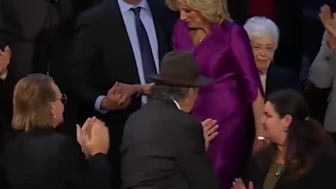 Joe Biden wife kiss Kamala Harris husband