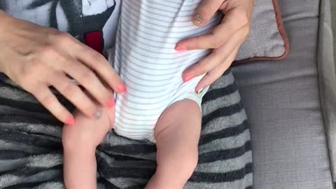 Cute Startled ticklish baby