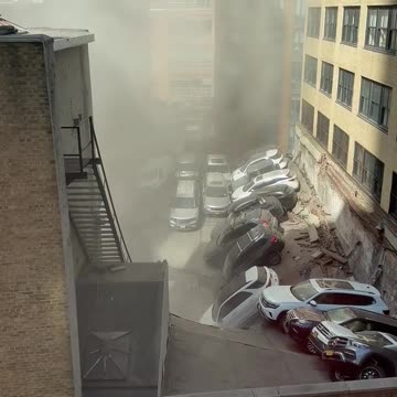 Parking garage collapse reported in Lower Manhattan, New York City; several people trapped