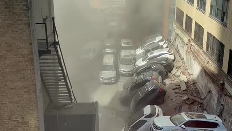 Parking garage collapse reported in Lower Manhattan, New York City; several people trapped