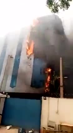The Central Bank of Sudan burns in the capital, Khartoum, due to intense fighting.
