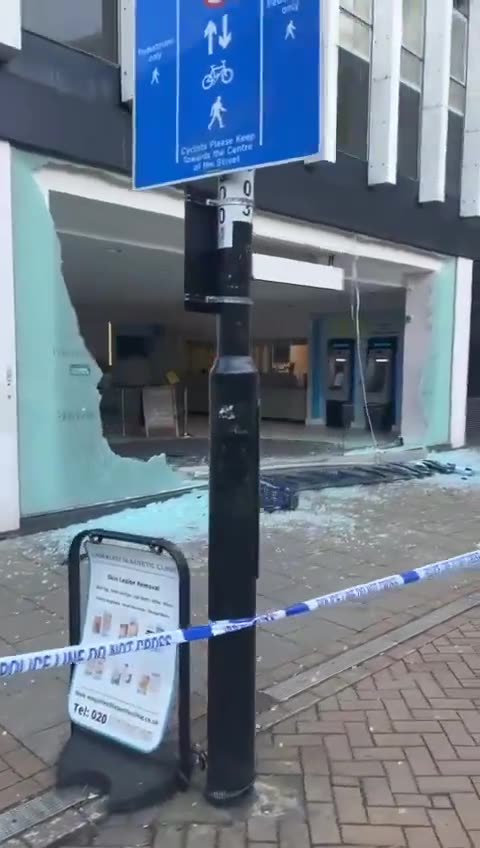 Barclays Bank Croydon, London has windows smash by Palestinian activists and red graffiti sprayed