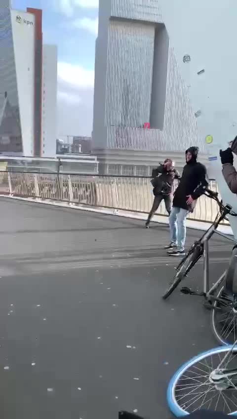 WINDY! BRIDGE IN ROTTERDAM