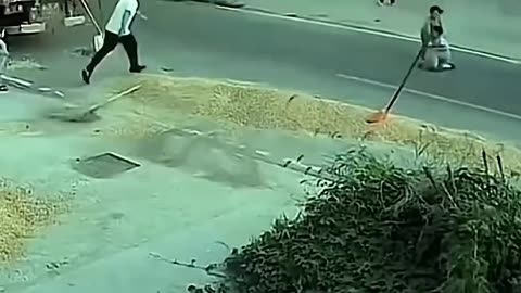 A small boy runs under a vehicle. But, luckily he gets saved.