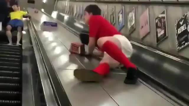 Young Boy plays foolish on an Escalator: WATCH TILL END