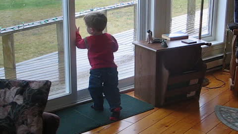 Kid takes pride in his window cleaning