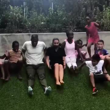 Ocasio-Cortez Playing With Children