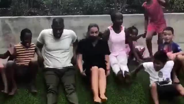 Ocasio-Cortez Playing With Children