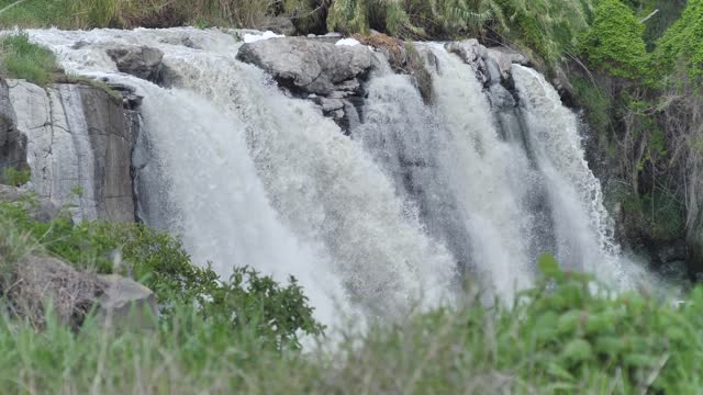 Rocky waterfall on a river in nature