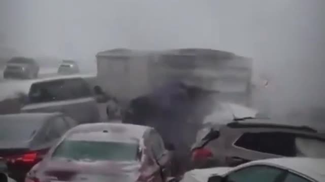 Snowstorm with low visibility. Let's all drive like it's a clear sunny day!