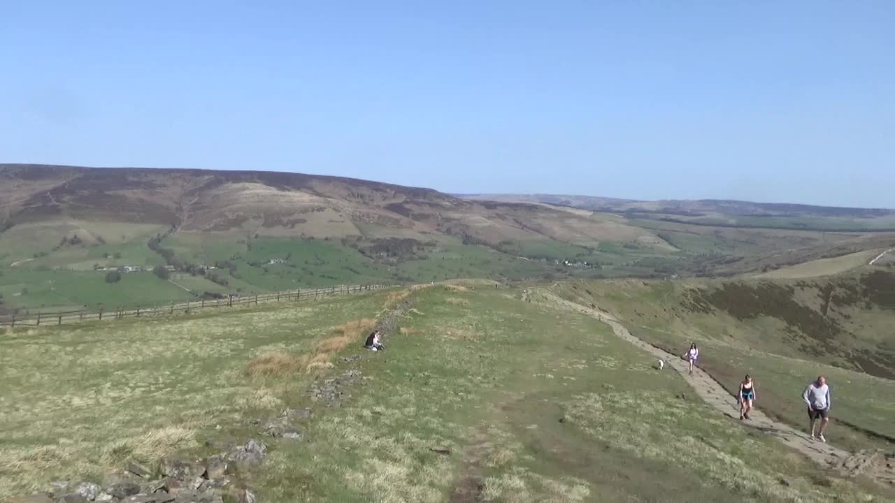 The views climbing and from the top of Mam Tor Peak district Derbyshire