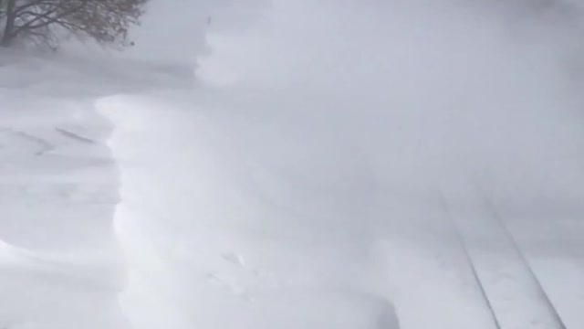 Train Travels Through Massive Snow Drift