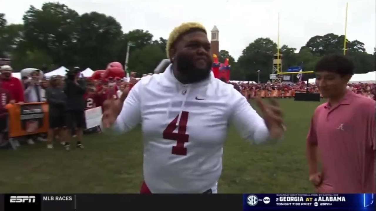 Druski almost knocked somebody out in the crowd with a football while trying to kick a field goal