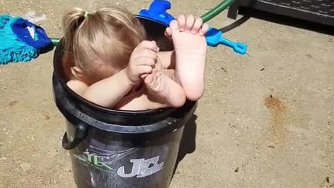 Dad Discovers Daughter Stuck In Bucket