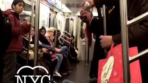 Mta magician man in black outfit does magic