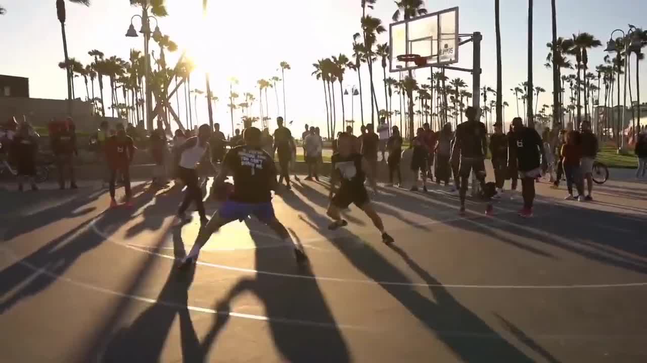 playing basketball at sunset