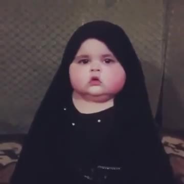 A very Very cute kid Smiling when ask something love this